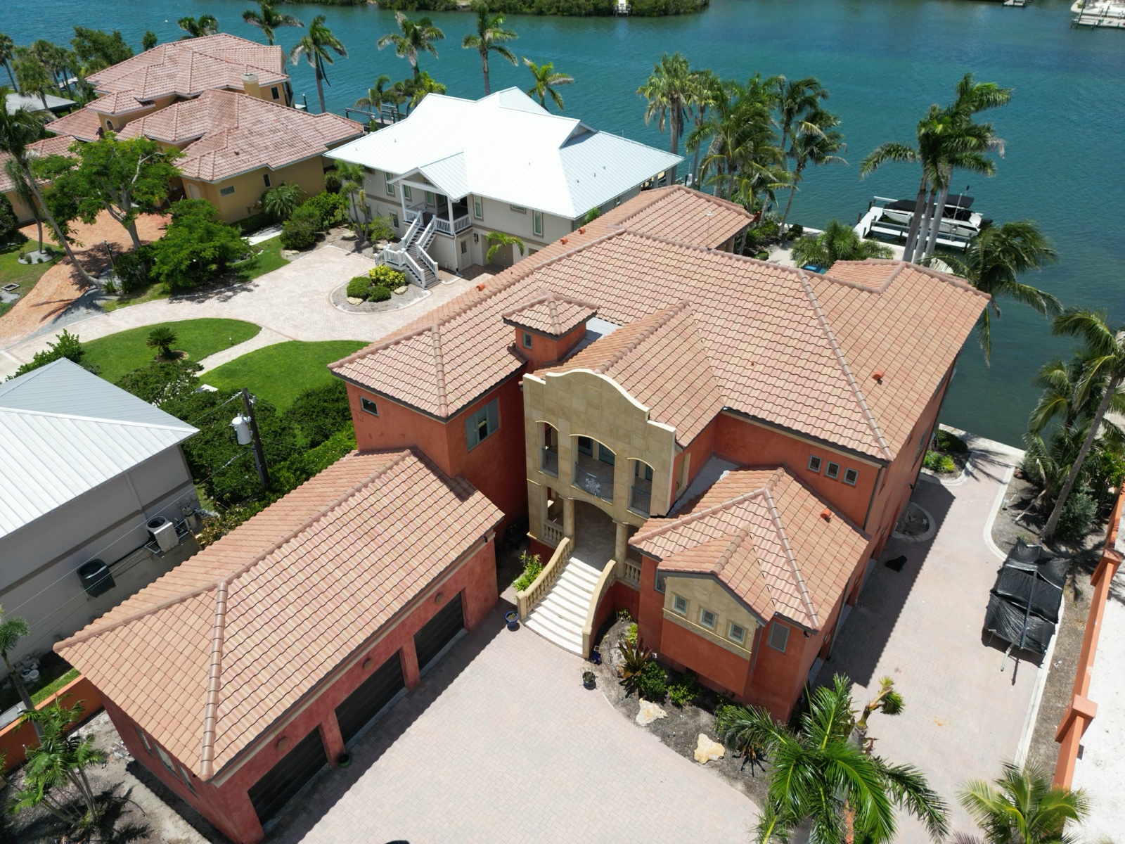 Completed barrel tile roof on a waterfront estate